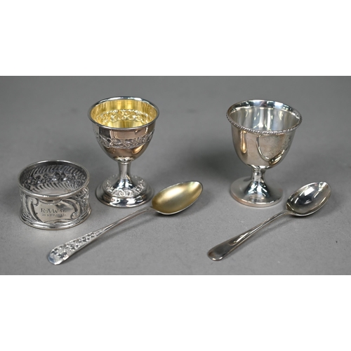 131 - Two cased silver egg cups with spoons - one also with napkin ring - to/w a cased miniature condiment... 