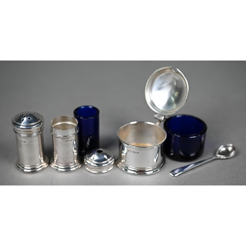 131 - Two cased silver egg cups with spoons - one also with napkin ring - to/w a cased miniature condiment... 