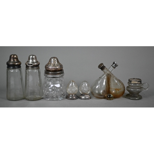 16 - An Edwardian glass oil and vinegar double-bottle with silver tops, Birmingham 1904, to/w three pairs... 