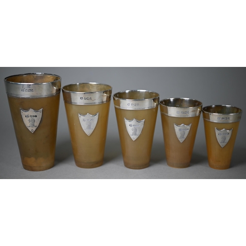 177 - An Edwardian graduated set of five silver-mounted horn beakers, Frederick C. Asman & Co, Sheffie... 