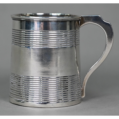 193 - A George III silver small mug with reeded banding, Elizabeth Morley, London 1810, 2.6oz, 6.5cm high