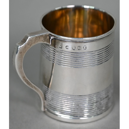 193 - A George III silver small mug with reeded banding, Elizabeth Morley, London 1810, 2.6oz, 6.5cm high