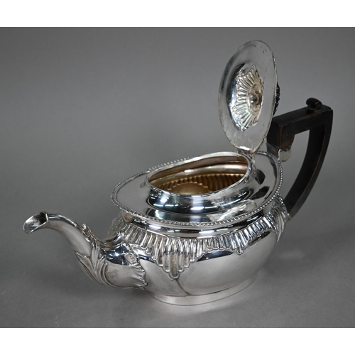 199 - A late Victorian silver three-piece tea service with gadrooned rims and lobed bodies with fluted det... 