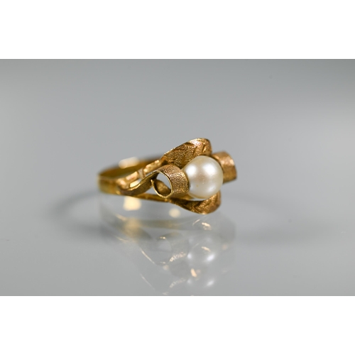 200 - Two pearl set rings, one unmarked yellow metal in scroll setting, size N (shank distorted), the othe... 