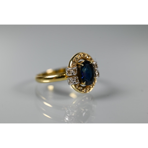 202 - An oval sapphire and diamond cluster ring, 18ct yellow gold set, size N, approx 4.4g all in