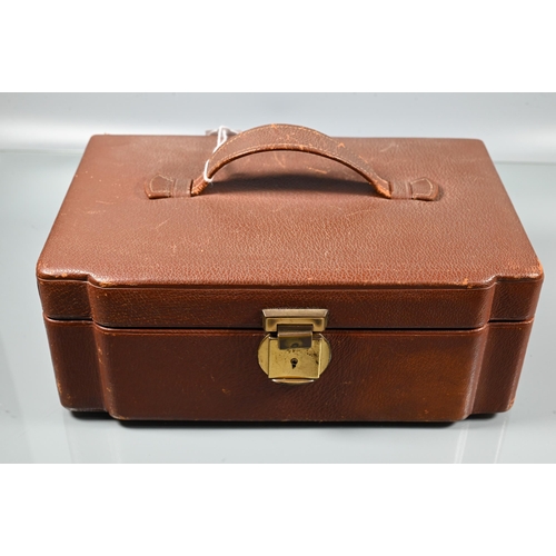 204 - A brown leather jewel box with fitted interior and lift out lid, including modern costume jewellery ... 