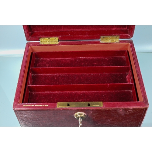 205 - A dark red jewel case with dark red velvet-lined fitted interior and two lift out trays, Bramah lock... 