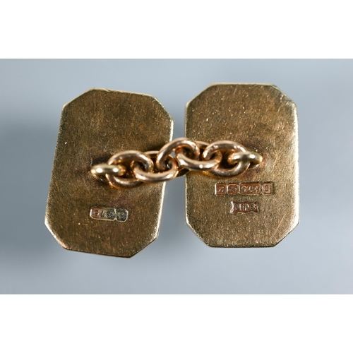 212 - A pair of 9ct yellow gold rectangular cufflinks with canted corners, chain-linked, with engraved I96... 