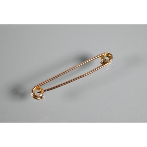 213 - A 9ct rose gold safety-pin brooch, approx 2.5g in fitted case to/w knot style stick pin set white pa... 