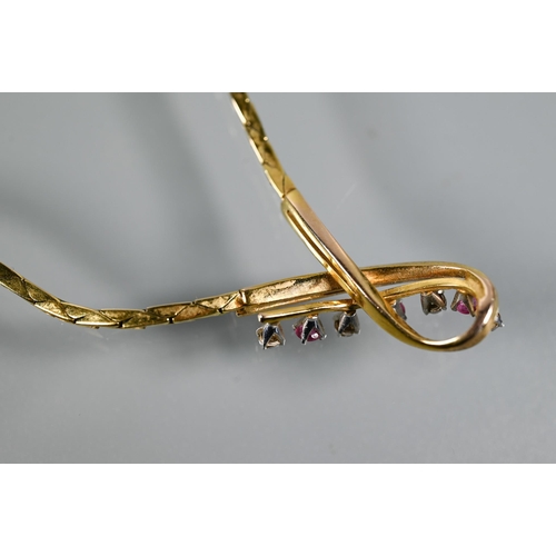 215 - A 9ct yellow gold necklace of flat triangular links with central ribbon twist set rubies and diamond... 