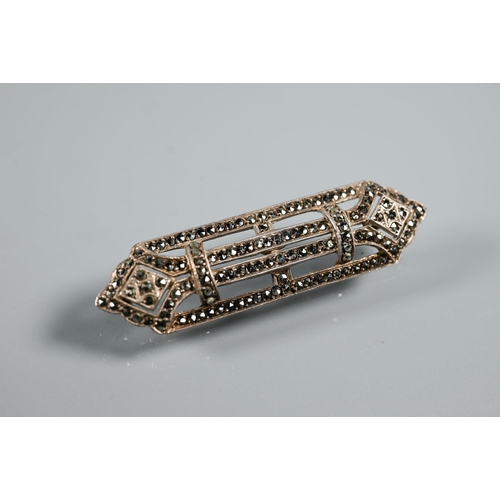 219 - An Irish silver and marcasite brooch in the form of a harp, an Art Deco marcasite brooch, a part dre... 