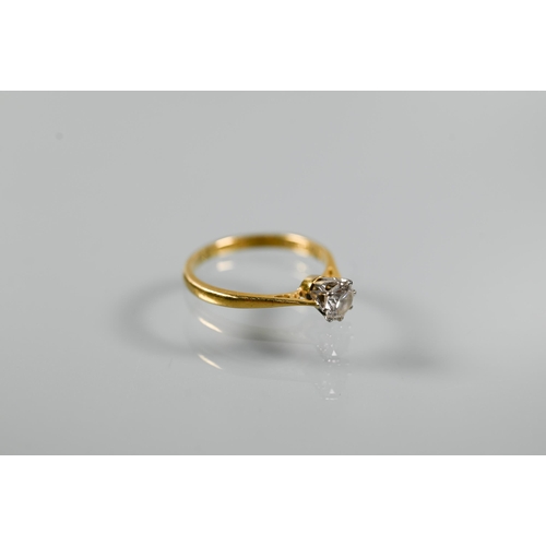 226 - A single stone diamond ring, the brilliant cut diamond in coronet setting with scroll shoulders, 18c... 