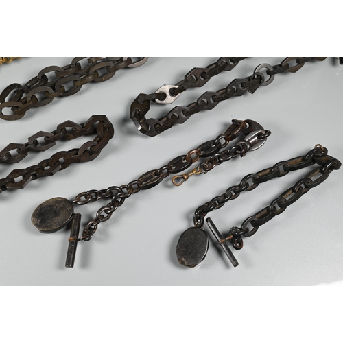 229 - A collection of various 19th century watch/Albert chains and other chains, including jet, bog oak, b... 