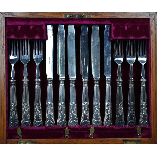25 - An oak-cased set of twelve each kings pattern dessert knives and forks, to/w an entrée dish and cove... 