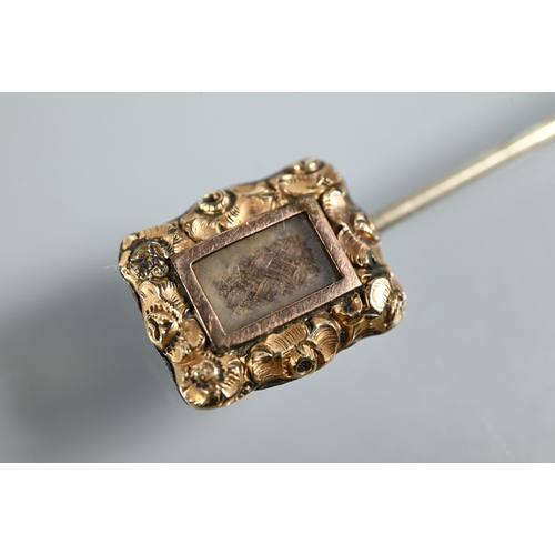 265 - A gilt metal pendant in the form of a cross, with polychrome floral enamel decoration, two enamel ch... 