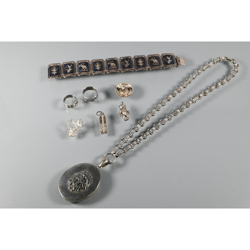 267 - A Thai niello plaque bracelet, a white metal oval locket with applied monogram to front suspended on... 