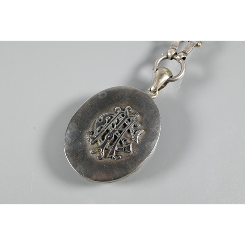 267 - A Thai niello plaque bracelet, a white metal oval locket with applied monogram to front suspended on... 