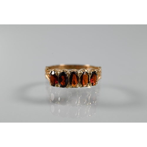 268 - Three rings - a rectangular step cut citrine in 9ct yellow gold shank with decorative plume shoulder... 