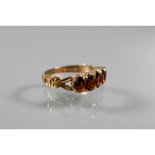 268 - Three rings - a rectangular step cut citrine in 9ct yellow gold shank with decorative plume shoulder... 