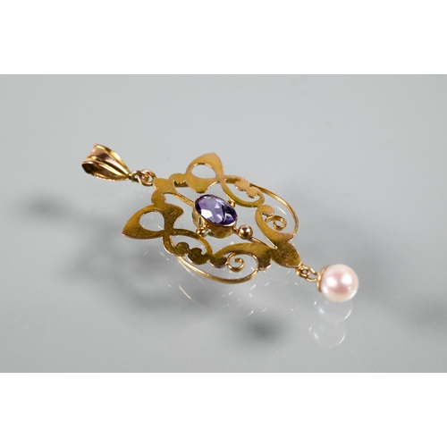 270 - An Art Nouveau pendant, the open scroll design with central oval amethyst and round cultured pearl d... 