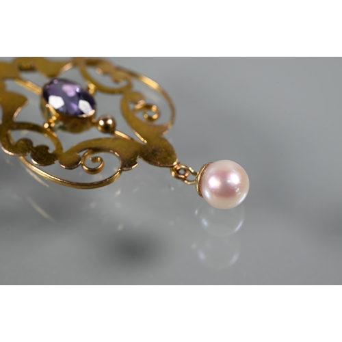 270 - An Art Nouveau pendant, the open scroll design with central oval amethyst and round cultured pearl d... 