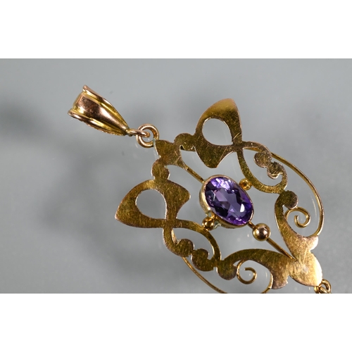 270 - An Art Nouveau pendant, the open scroll design with central oval amethyst and round cultured pearl d... 