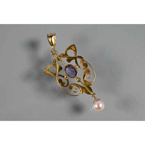 270 - An Art Nouveau pendant, the open scroll design with central oval amethyst and round cultured pearl d... 