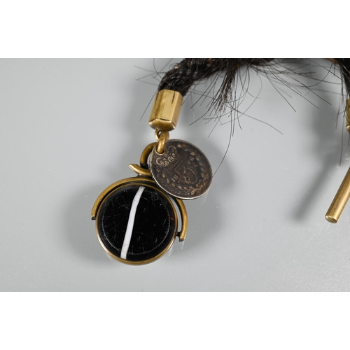 272 - Two Victorian hairwork Alberts with swivel, bar and one with agate fob attached, a/f (2)