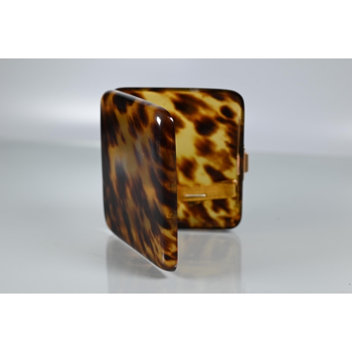 276 - A faux tortoiseshell rectangular cigarette case with 9ct yellow gold thumbpiece and hinges, maker H ... 