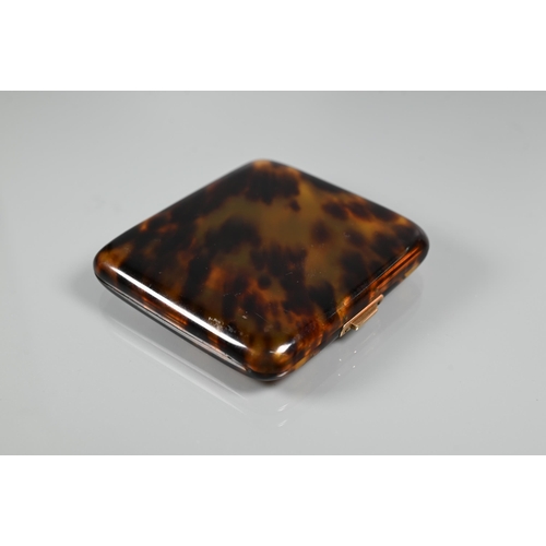 276 - A faux tortoiseshell rectangular cigarette case with 9ct yellow gold thumbpiece and hinges, maker H ... 