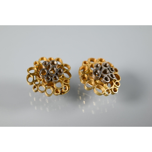 282 - John Donald (1928-2023) - A pair of vintage clip-on earrings in the form of irregular circlet rods, ... 