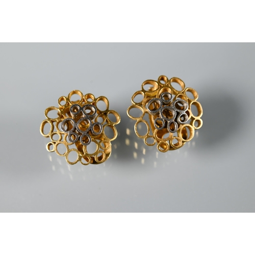 282 - John Donald (1928-2023) - A pair of vintage clip-on earrings in the form of irregular circlet rods, ... 