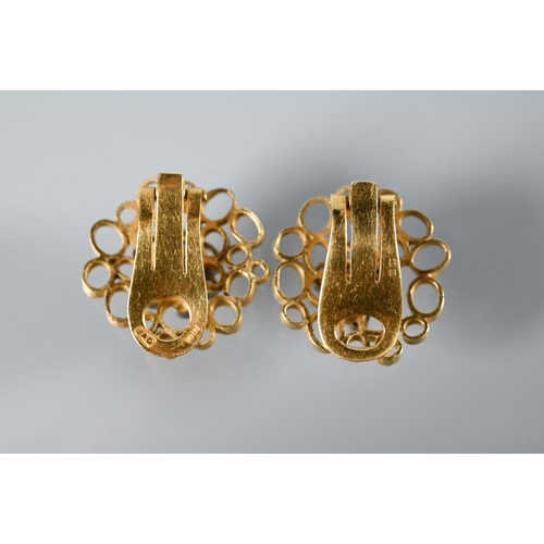 282 - John Donald (1928-2023) - A pair of vintage clip-on earrings in the form of irregular circlet rods, ... 