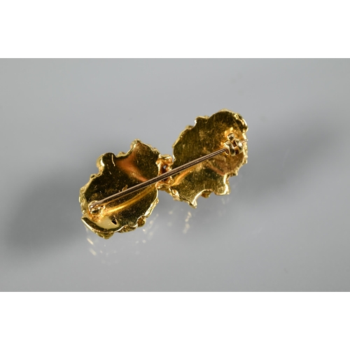 283 - John Donald (1928-2023) - A vintage 18ct yellow gold ring in the form of a gold nugget, makers mark ... 