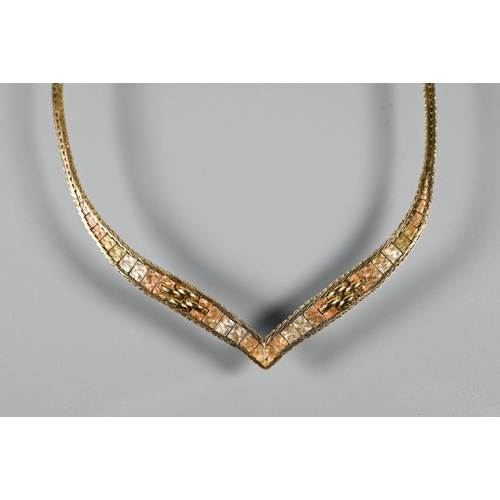 285 - A 9ct tri-coloured gold necklace of feather-link chain forming wishbone to centre of rectangular pla... 