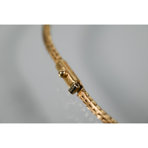 285 - A 9ct tri-coloured gold necklace of feather-link chain forming wishbone to centre of rectangular pla... 