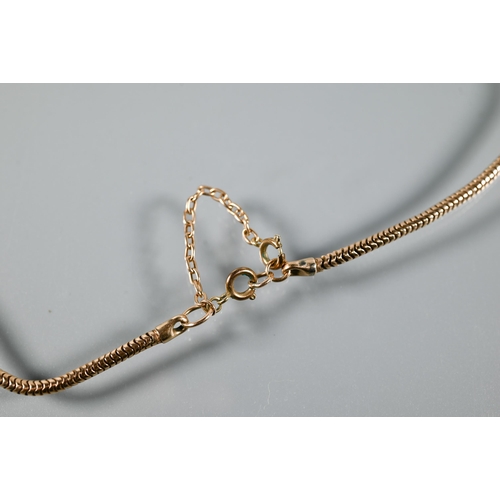 288 - A rose metal snake-link chain, 45 cm long, approx 15.5g all in (unmarked)