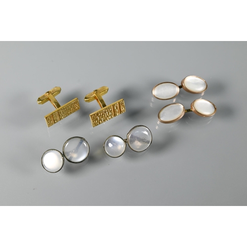 290 - A pair of moonstone-set chain link cufflinks, a pair of rectangular gilt metal swivel cufflinks and ... 