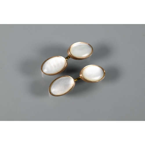 290 - A pair of moonstone-set chain link cufflinks, a pair of rectangular gilt metal swivel cufflinks and ... 