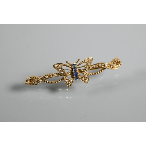 291 - Three various 9ct brooches - a white gold floral spray set with sapphires, a bar brooch in the form ... 