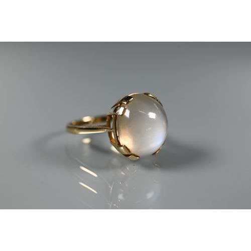 293 - A 9ct yellow gold ring set with single oval moonstone in claw setting, size N, 1.5 x 1.2 cm diam to/... 