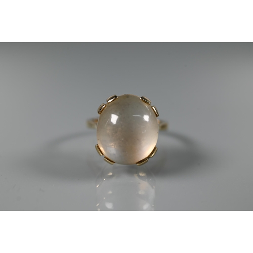 293 - A 9ct yellow gold ring set with single oval moonstone in claw setting, size N, 1.5 x 1.2 cm diam to/... 