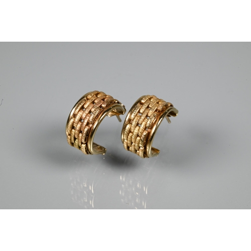 296 - A pair of yellow metal half-hoop earrings with brick style decoration, stamped 9kt, approx 5.4g