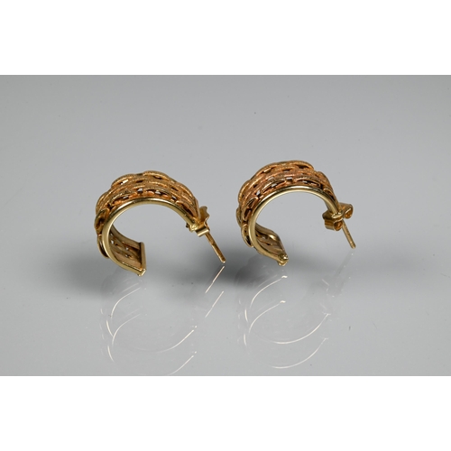 296 - A pair of yellow metal half-hoop earrings with brick style decoration, stamped 9kt, approx 5.4g