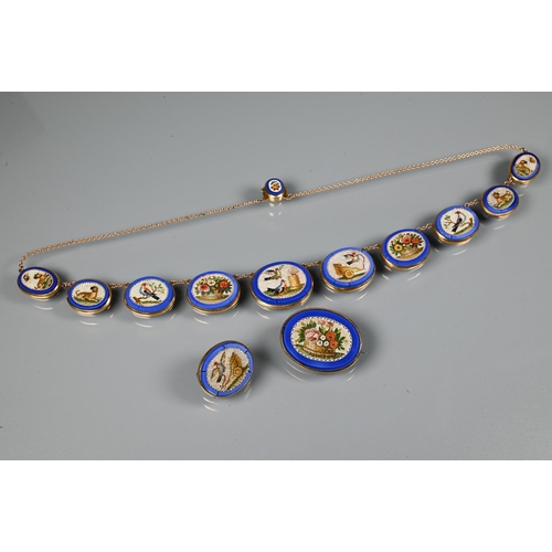 A Victorian 'Grand Tour' micro-mosaic necklace, the ten graduated oval plaques featuring birds, dogs, flowers, cart etc in polychrome micro-mosaics on lapis lazuli ground with chain links between, with micro-mosaic clasp, yellow metal set, 44 cm long and c/w two similar brooches (some plaques cracked)