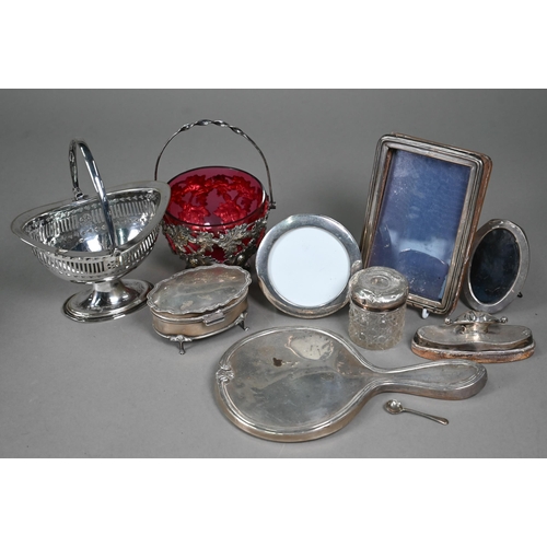 30 - A silver ring-box, nail-buffer, hand-mirror, toilet jar and three small photograph frames, to/w a Vi... 
