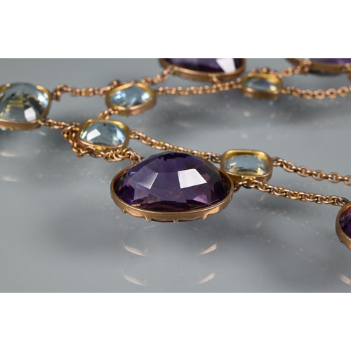 300 - A Victorian amethyst and aquamarine necklace, the four rectangular cushion cut aquamarines above a t... 