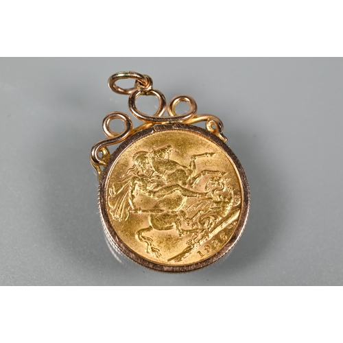 302 - A George IV gold sovereign, dated 1926, in pendant mount, approx 10g all in