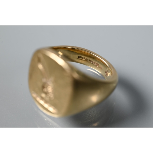 306 - A 9ct yellow gold signet ring with crest, size G, approx 8.2g