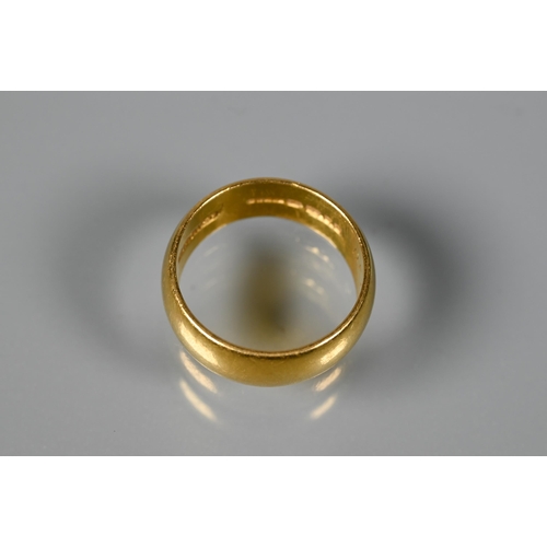 307 - A wide 22 ct yellow gold wedding band, size J 1/2, approx 7g